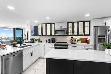 Welcome to an exceptional waterfront retreat in the highly - photo 13