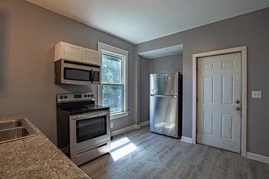 Adorable home with covered front porch. Large entry foyer for - photo 23
