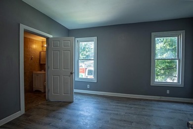 Adorable home with covered front porch. Large entry foyer for - photo 30