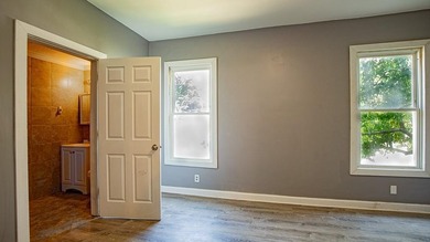 Adorable home with covered front porch. Large entry foyer for - photo 31