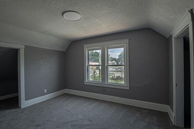Adorable home with covered front porch. Large entry foyer for - photo 38