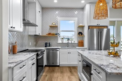 Experience the pinnacle of coastal elegance in this stunning - photo 24