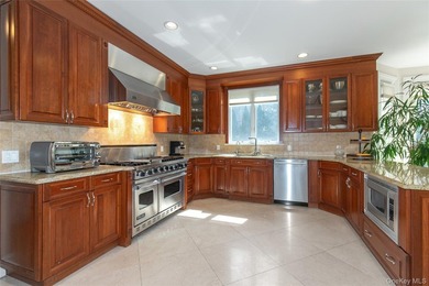 LAKE SUCCESS - A Stately Brick Colonial Set On Beautifully - photo 9