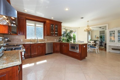 LAKE SUCCESS - A Stately Brick Colonial Set On Beautifully - photo 10