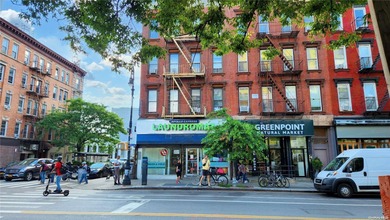 I'm happy to offer this income-producing, recently updated - photo 2