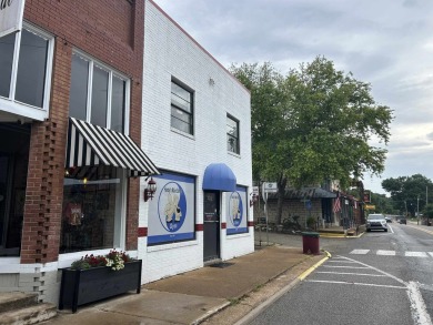 Two-story, fully functional commercial building on main street