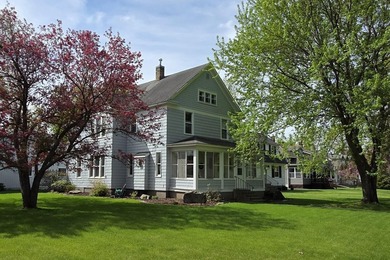 This light-filled 6-bed, 4-bath vintage home on Riverside Drive - photo 1