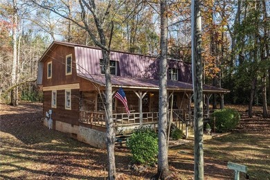 This a real lakefront log cabin with all the comforts, modern - photo 12