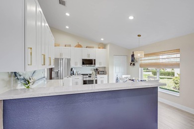 Nestled within a gated community, this spacious split-plan home