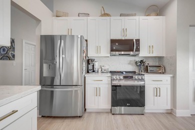 Nestled within a gated community, this spacious split-plan home