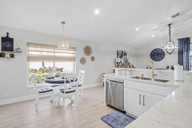 Nestled within a gated community, this spacious split-plan home