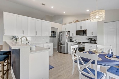 Nestled within a gated community, this spacious split-plan home