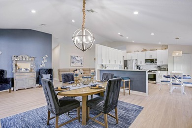 Nestled within a gated community, this spacious split-plan home