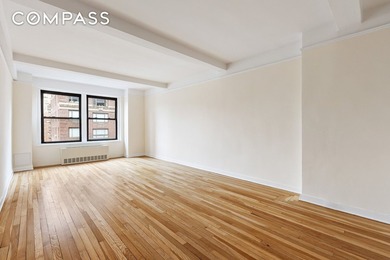 Open western city views highlight this bright corner one-bedroom - photo 7