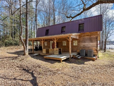 This a real lakefront log cabin with all the comforts, modern - photo 40