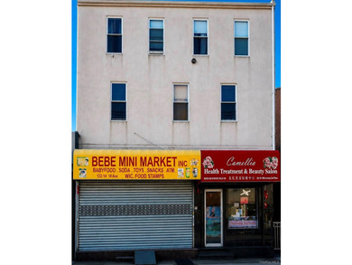 Exceptional mixed-use property in the heart of Flushing. This - photo 1
