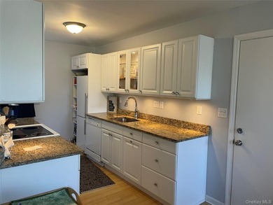 This inviting second-floor condo in Westhampton offers a - photo 6