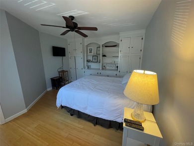 This inviting second-floor condo in Westhampton offers a - photo 9