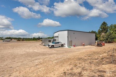 2400 sf shop with over-sized drive through bay doors. 18' eaves - photo 3