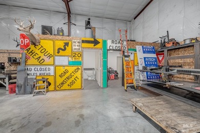 2400 sf shop with over-sized drive through bay doors. 18' eaves - photo 7