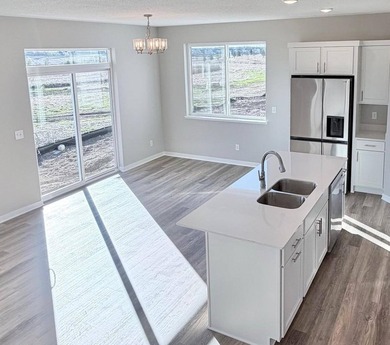 Highlights include a spacious 4 BAY GARAGE, Two Story modern - photo 5