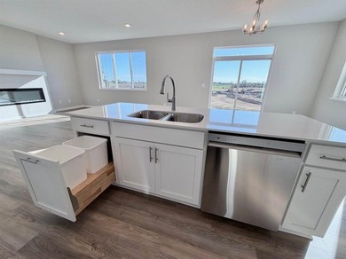 Highlights include a spacious 4 BAY GARAGE, Two Story modern - photo 6