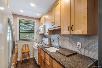 Experience top-floor privacy in this beautifully maintained - photo 5
