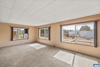 Gorgeous, panoramic mountain views from your living room in this - photo 6