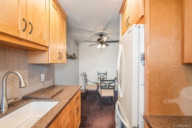 Experience top-floor privacy in this beautifully maintained - photo 7