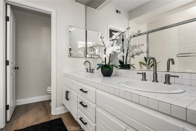 Rare Single-Level End Unit Backing to Mason Regional Park in the