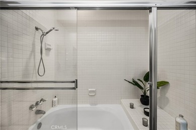 Rare Single-Level End Unit Backing to Mason Regional Park in the