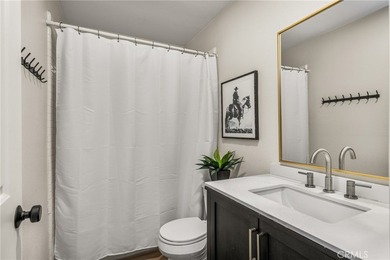 Rare Single-Level End Unit Backing to Mason Regional Park in the