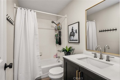 Rare Single-Level End Unit Backing to Mason Regional Park in the