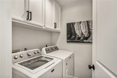 Rare Single-Level End Unit Backing to Mason Regional Park in the