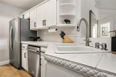 Rare Single-Level End Unit Backing to Mason Regional Park in the