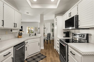 Rare Single-Level End Unit Backing to Mason Regional Park in the