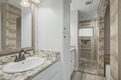 Tucked away on a quiet, tree-lined street, this beautifully - photo 16