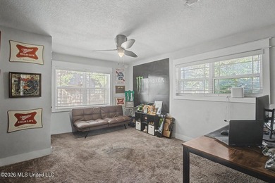 Tucked away on a quiet, tree-lined street, this beautifully - photo 19