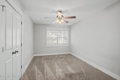 Tucked away on a quiet, tree-lined street, this beautifully - photo 23