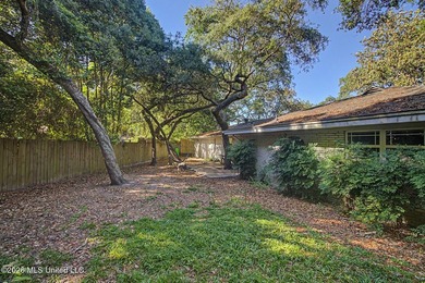 Tucked away on a quiet, tree-lined street, this beautifully - photo 29