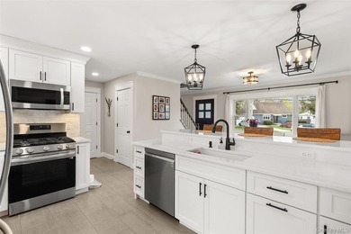 This beautifully renovated Colonial in East Islip sits on an - photo 4