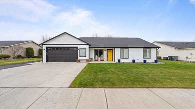 MLS# 290430 Pristine, move-in ready single-level residence with