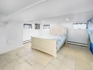 Discover a charming waterfront retreat in Oceanside, NY. This - photo 11