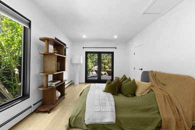 Discover a private Hamptons sanctuary where modern luxury meets - photo 16