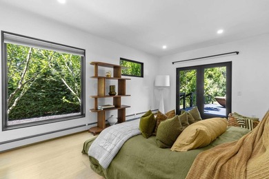 Discover a private Hamptons sanctuary where modern luxury meets - photo 17