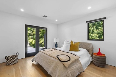 Discover a private Hamptons sanctuary where modern luxury meets - photo 20