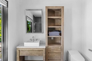 Discover a private Hamptons sanctuary where modern luxury meets - photo 23