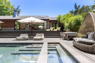 Discover a private Hamptons sanctuary where modern luxury meets - photo 29