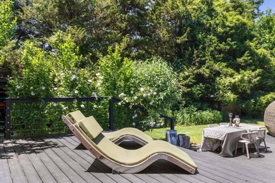 Discover a private Hamptons sanctuary where modern luxury meets - photo 30