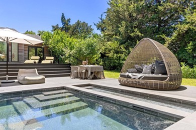 Discover a private Hamptons sanctuary where modern luxury meets - photo 36